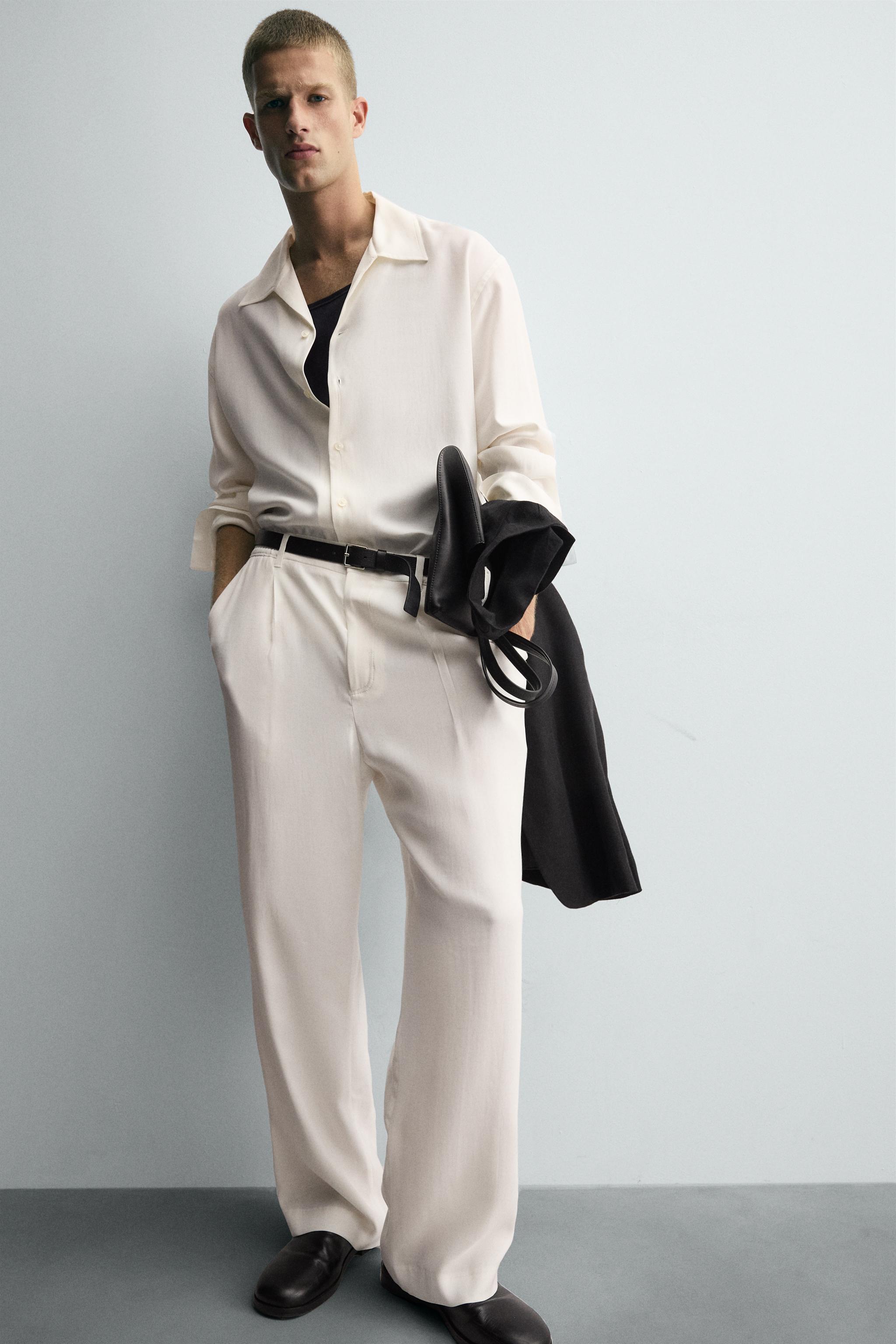 PANTALON COUPE DÉCONTRACTÉE PLIS